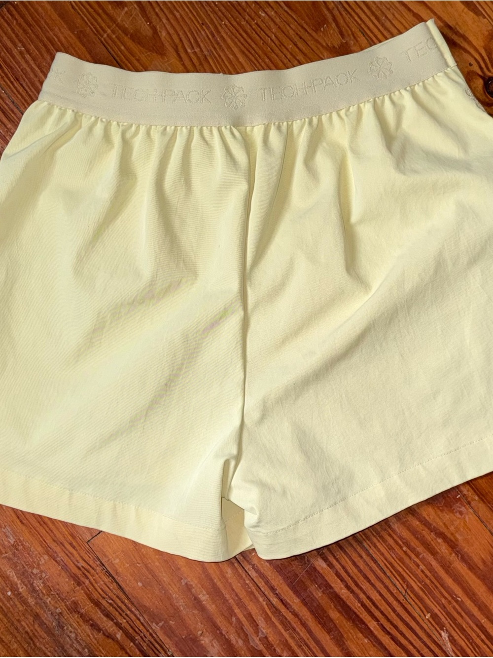 Nike Tech Pack High-Rise Wraparound Skort | Butter Yellow | XS - Picture 10 of 12